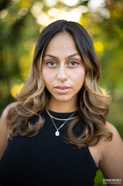 Emalie x Black Sleeveless Top Blue Jean Pants With Golden Hour Lighting
